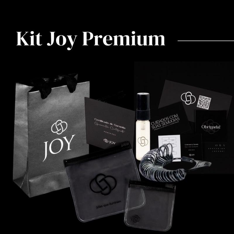 KIT JOY PREMIUM - 6 SACOLAS JOY -  6 CERTIFICADOS DE GARANTIA -  3 BOLSINHA ZIP LOCK G -  3 ZIP LOCK P -  6 PAPELARIAS -  1 ANELEIRA -  1 FRAGRÂNCIA
