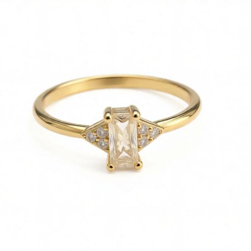 ANEL SOLITÁRIO PEDRA RETANGULAR CENTRAL E ZIRCONIAS EM TRIANGULO LATERAL